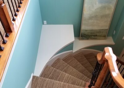A staircase with blue walls