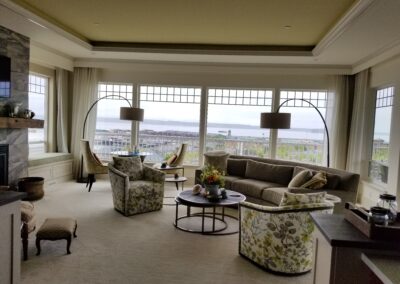 A living room with wide windows